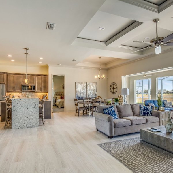 New flooring in an open concept kitchen and living room