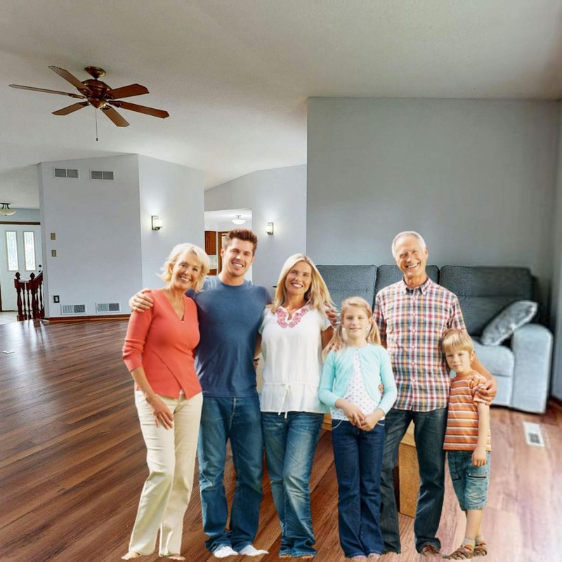 A family in a living room with hardwood floors
