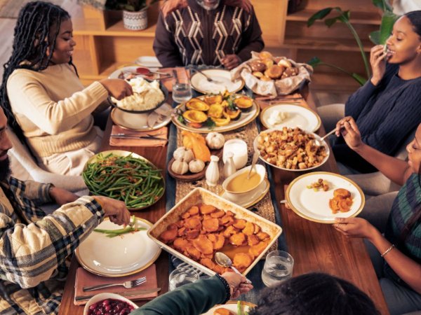 Family having Thanksgiving dinner together