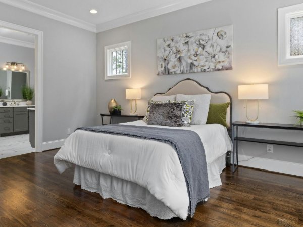 Hardwood flooring in a spacious bedroom
